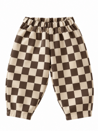 Roomwitte barrel kinderbroek met bruine ruit en wijde, naar de enkels smaller toelopende broekspijpen